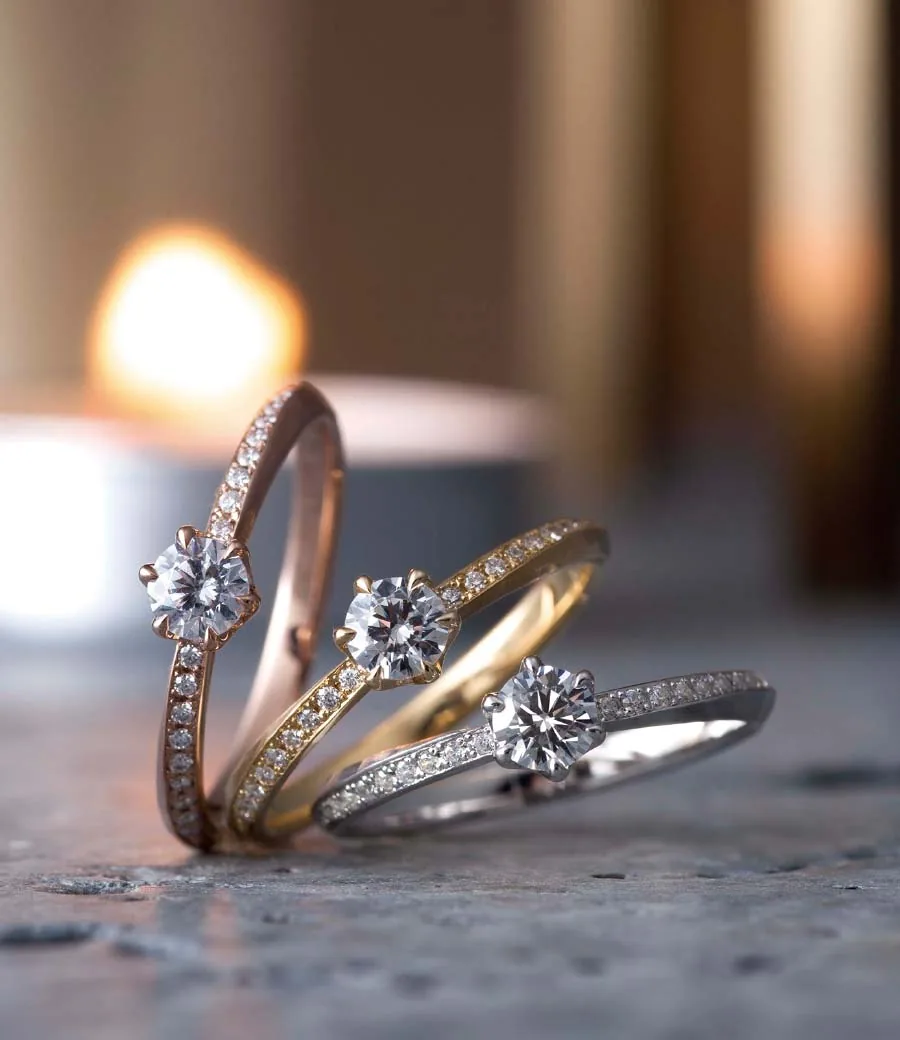 Flügel — Neu Spur wedding & engagement rings